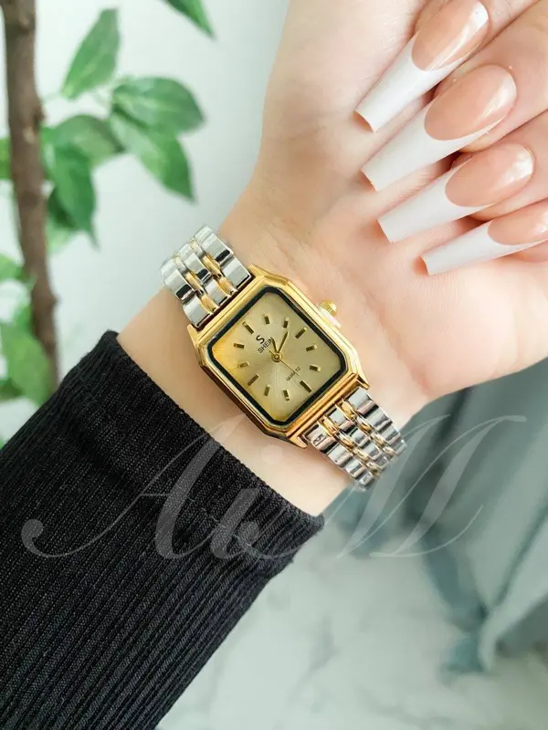 ساعة شين أنسيال إصدار كلاسيك فضي وذهبي حريمي