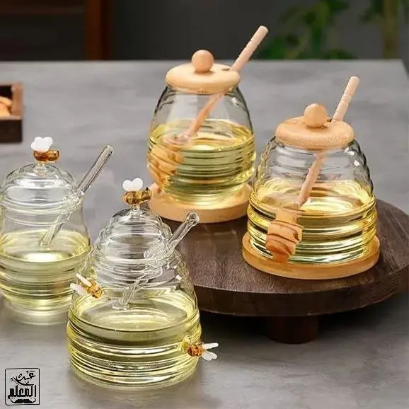 برطمان عسل زجاجي فاخر (مع مغرفة خشبية وغطاء محكم 500 مل)