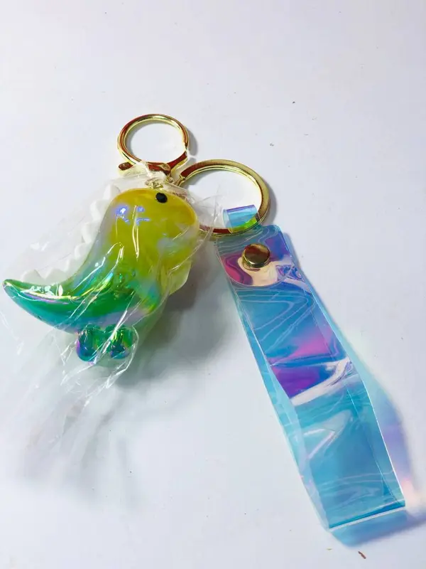 ميدالية الديناصور الساحرة، تصميم فريد بألوان جذابة