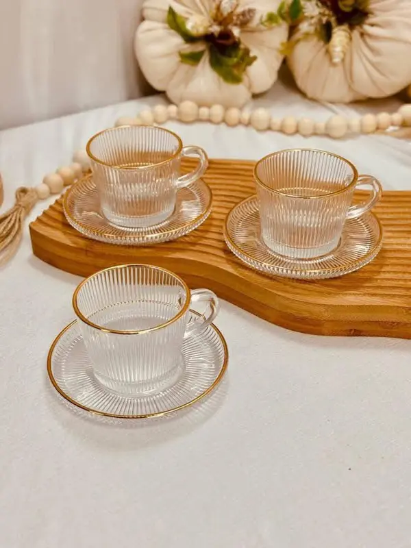 طقم الشاي الملكي "جولدن مونوجرام" 12 قطعة بتصميم أنيق وحرف ذهبي