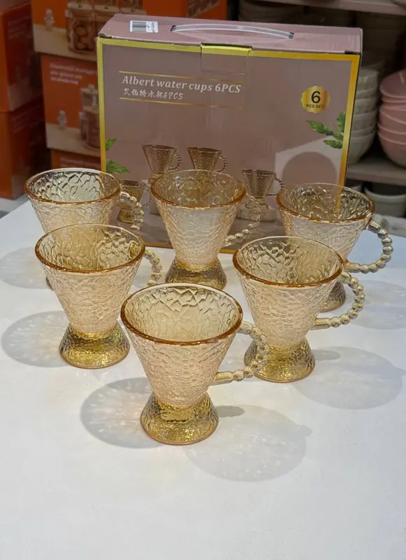 طقم فناجين زجاج عسلي 6 قطع (تصميم منقرش ومقابض بابلز)