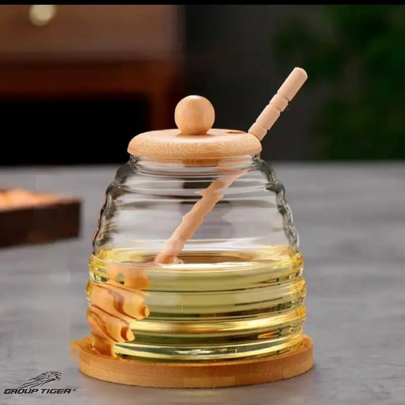 برطمان عسل زجاجي فاخر (مع مغرفة خشبية وغطاء محكم 500 مل)