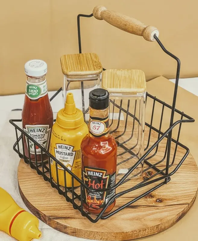 حامل صوصات معدني أسود